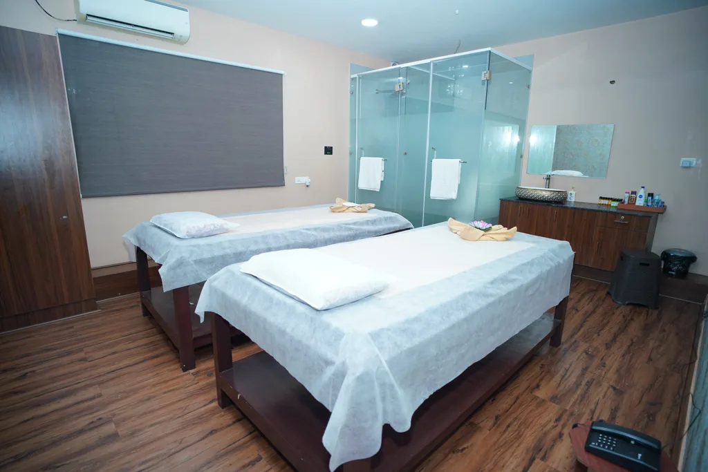 Couples suite with side-by-side massage beds at The Zen Spa & Lounge, Guntur